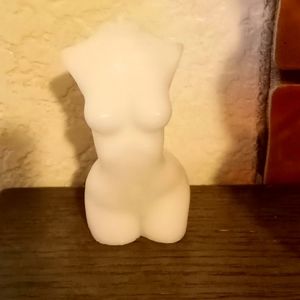 Unscented woman's torso candle